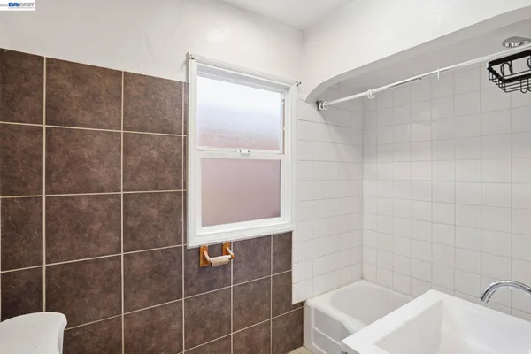 a bathroom with a sink and a shower