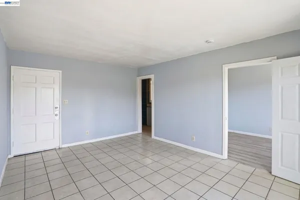a view of an empty room and window