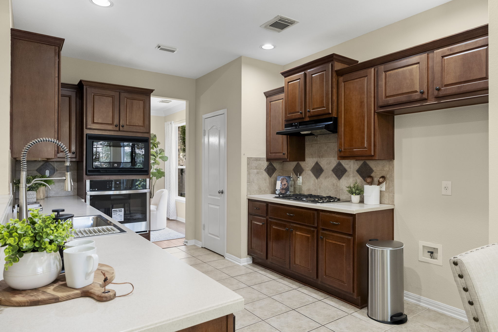 1822 Nelson Ranch Loop Cedar Park, TX 78613 - Photo 14 of 40 The spacious kitchen offers abundant cabinetry and generous counter space for everyday meal preparation.