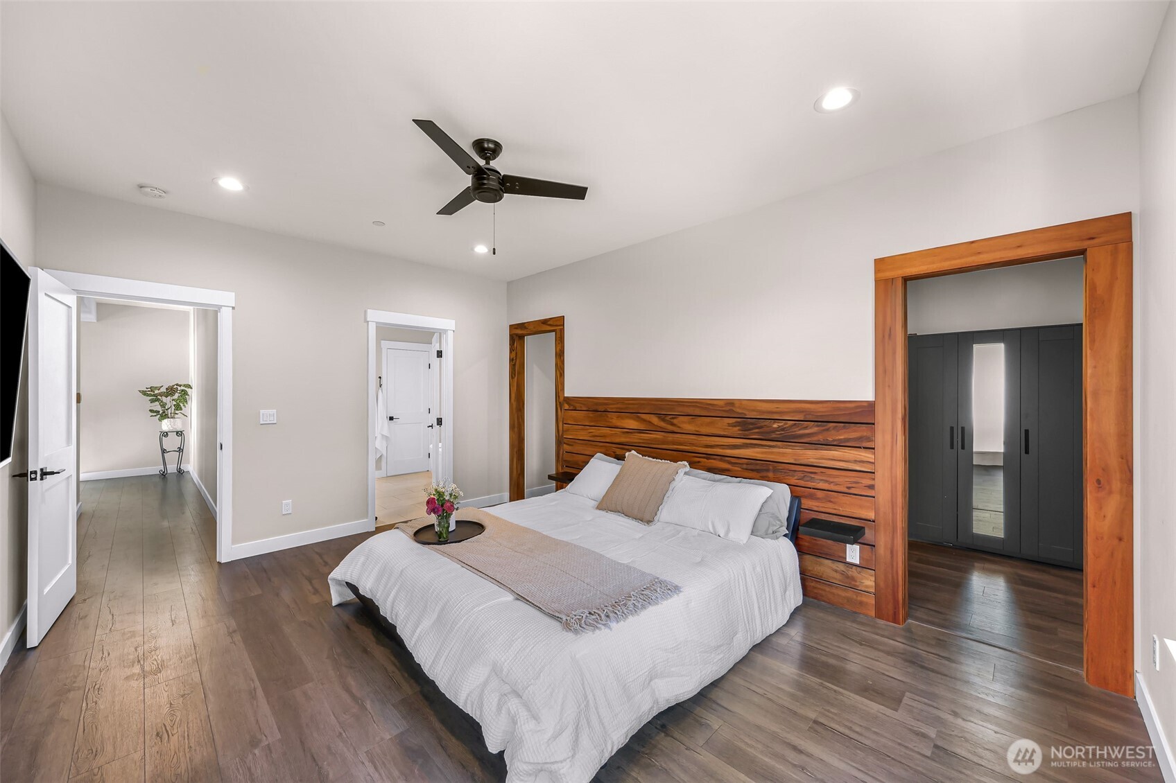 322 Manley Road Bellingham, WA 98229 - Photo 13 of 40 a bedroom with a bed and wooden floor