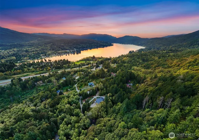 a view of a town with mountains in the background