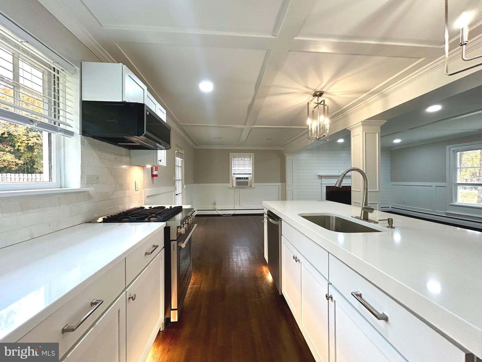 381 Upper Gulph Road Wayne, PA 19087 - Photo 4 of 17 a kitchen with a sink stove and cabinets