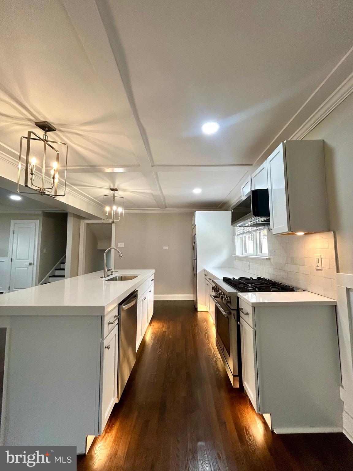 381 Upper Gulph Road Wayne, PA 19087 - Photo 5 of 17 a kitchen with stainless steel appliances a stove sink and cabinets