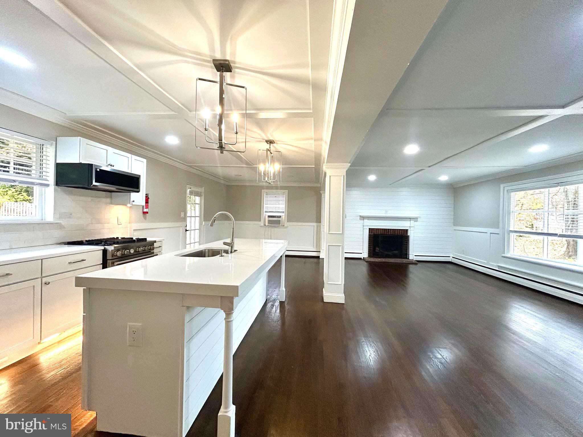 381 Upper Gulph Road Wayne, PA 19087 - Photo 6 of 17 a kitchen with a stove a sink and a refrigerator