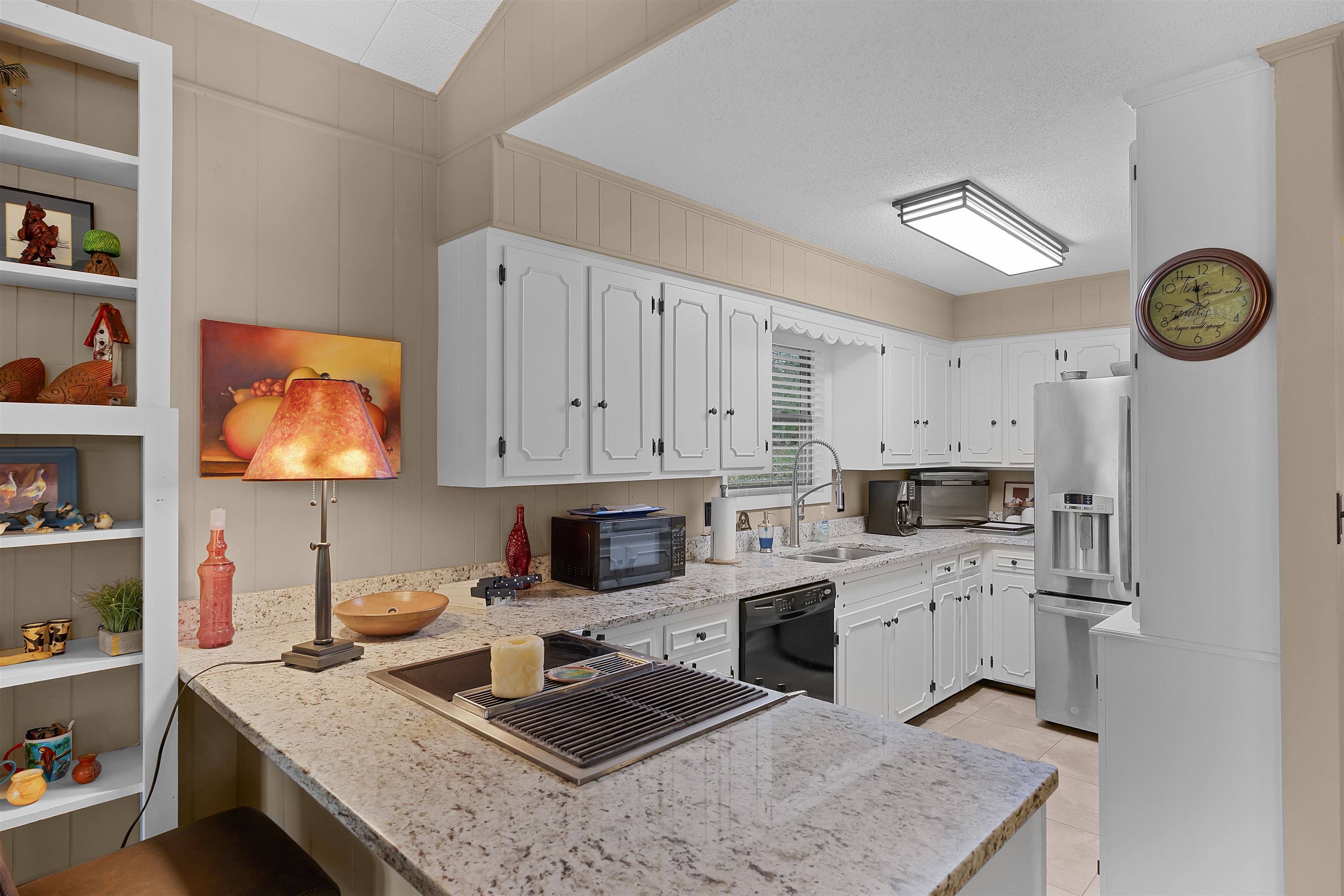 5 Cr 329 Road Iuka, MS 38852 - Photo 8 of 39 a kitchen with stainless steel appliances granite countertop a sink stove top oven and cabinets