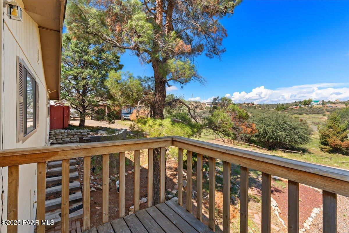 18246 Henry Coe Road Peeples Valley, AZ 86332 - Photo 14 of 20 06-Deck From Bedroom 1