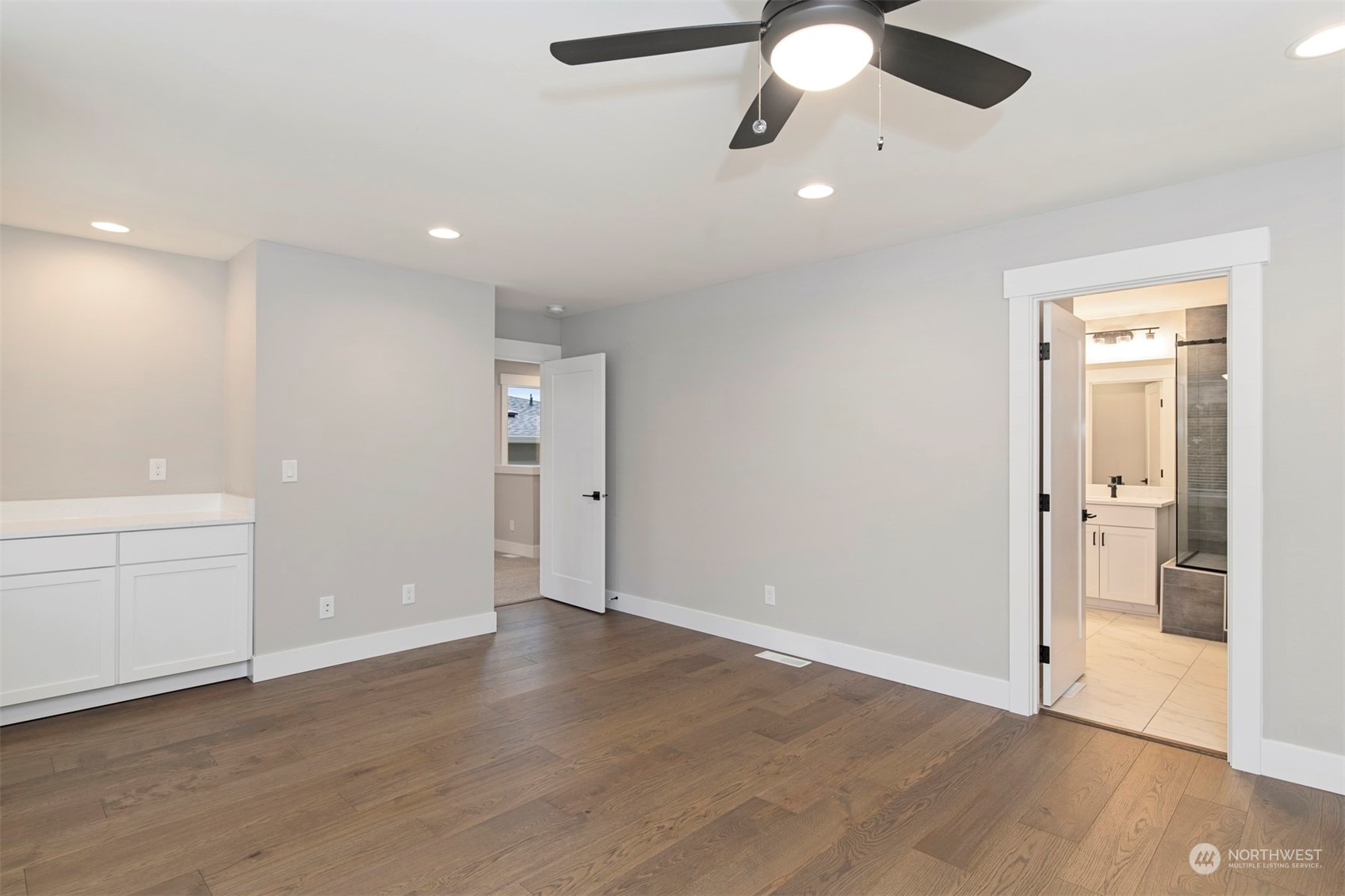 13015 75th Place South Seattle, WA 98178 - Photo 23 of 32 wooden floor in an empty room with a window