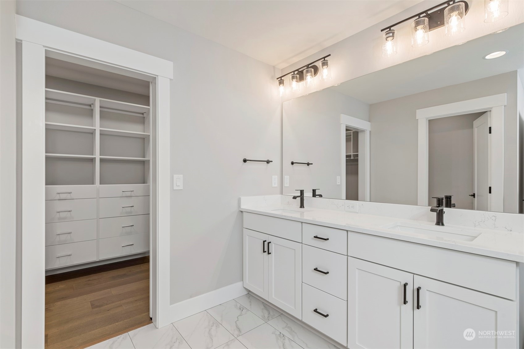 13015 75th Place South Seattle, WA 98178 - Photo 24 of 32 a bathroom with a double vanity sink and mirror