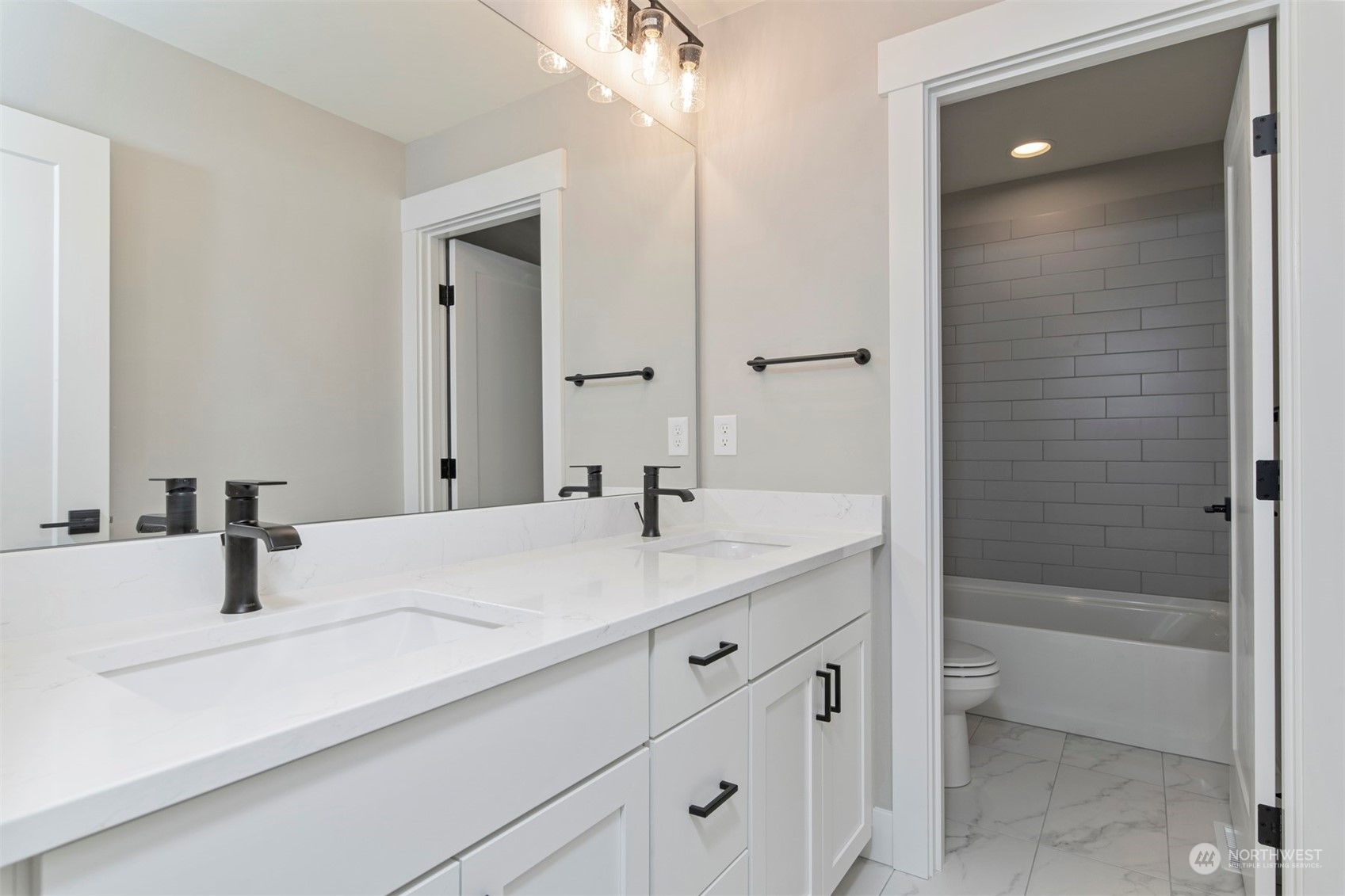 13015 75th Place South Seattle, WA 98178 - Photo 30 of 32 a bathroom with a sink and a mirror