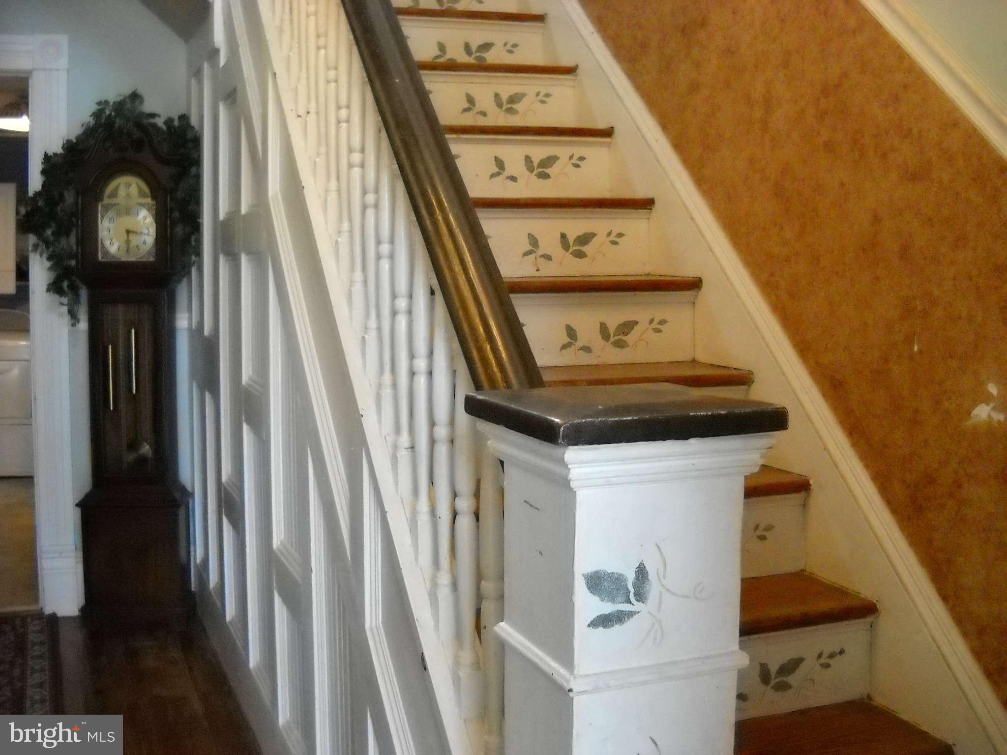 415 Hill Street Culpeper, VA 22701 - Photo 2 of 14 a view of a hallway with wooden floor and a hallway