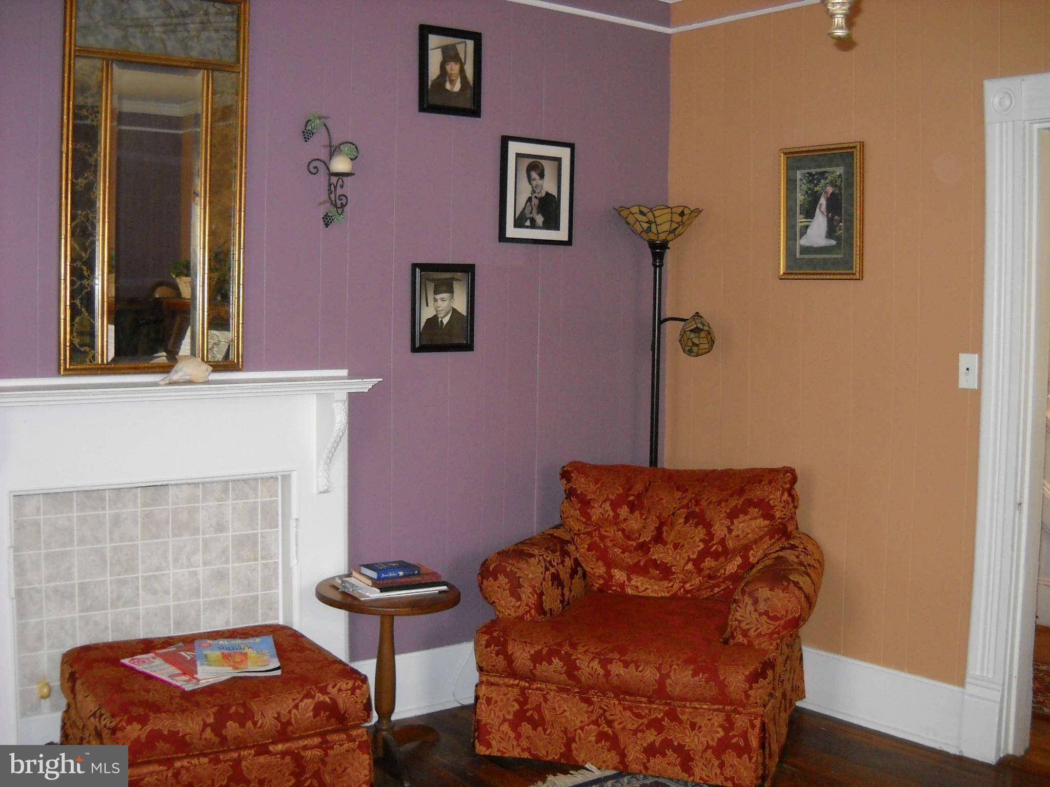 415 Hill Street Culpeper, VA 22701 - Photo 4 of 14 a living room with furniture and a fireplace
