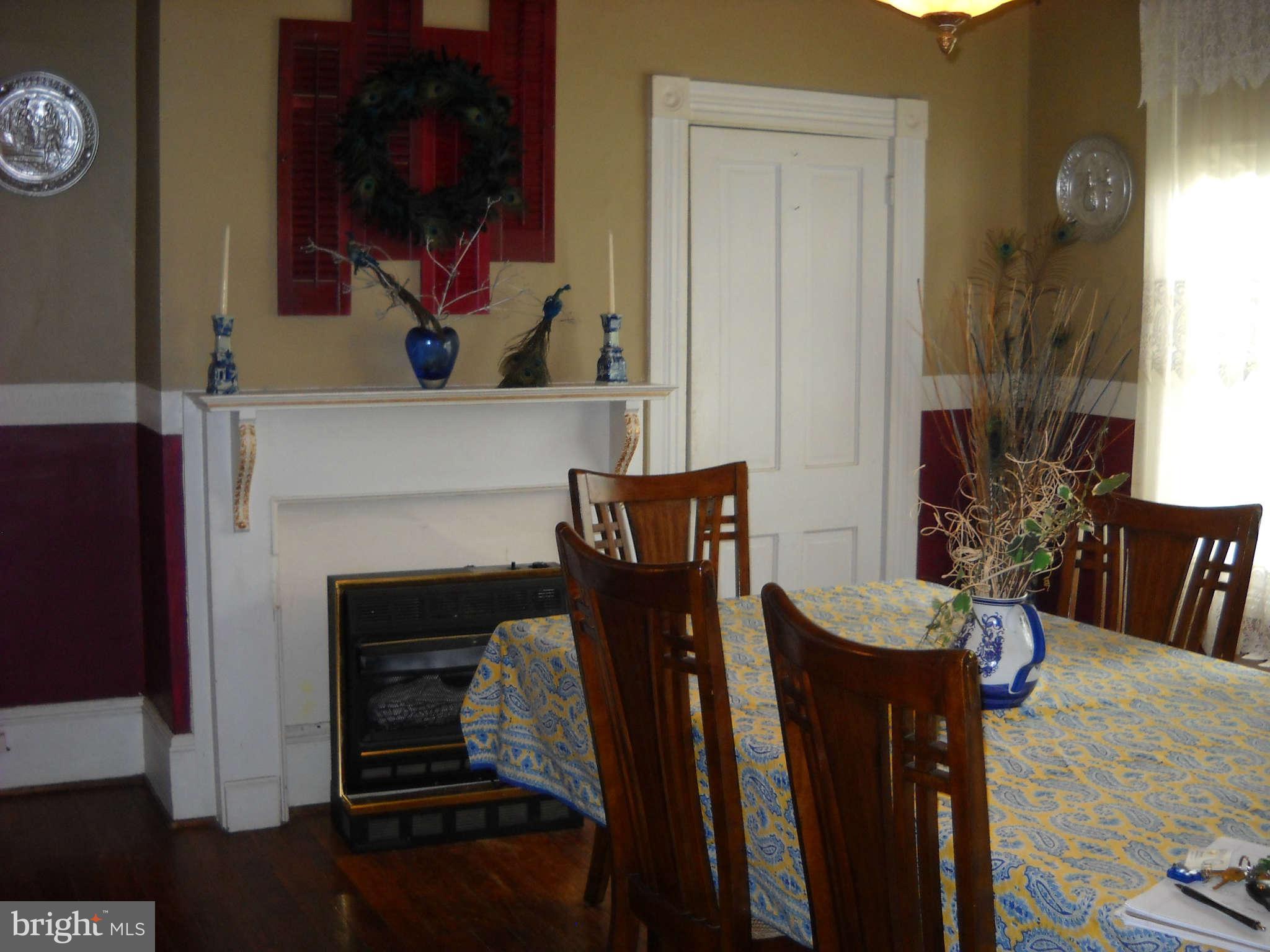 415 Hill Street Culpeper, VA 22701 - Photo 6 of 14 a living room with furniture and a fireplace