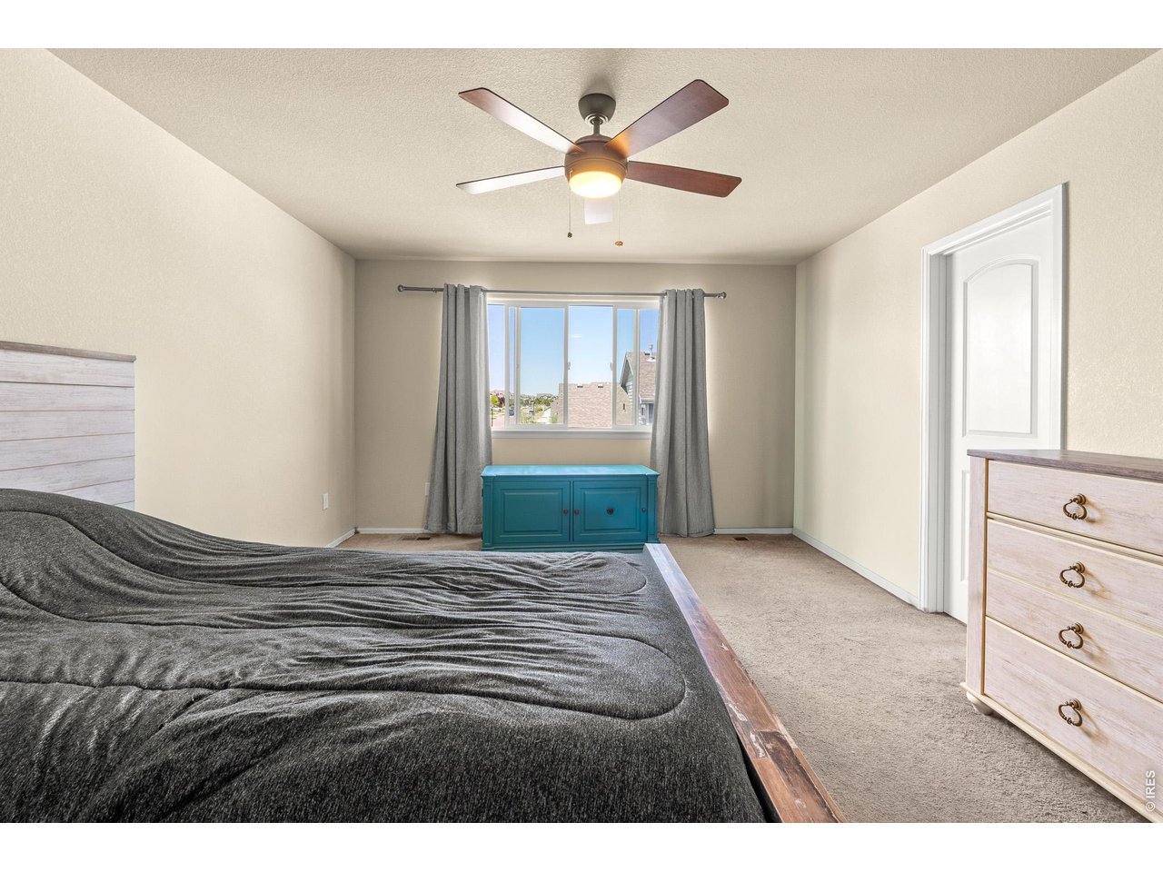 8847 16th St Road Greeley, CO 80634 - Photo 20 of 38 a view of empty room with cabinet and ceiling fan