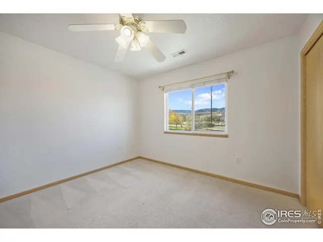 a bathroom with a sink a mirror and a shower