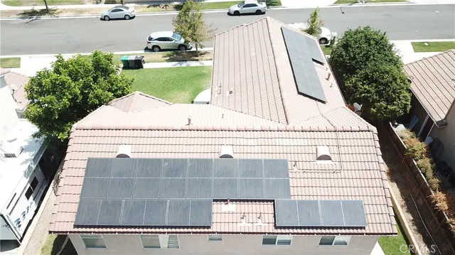 a view of backyard with swimming pool