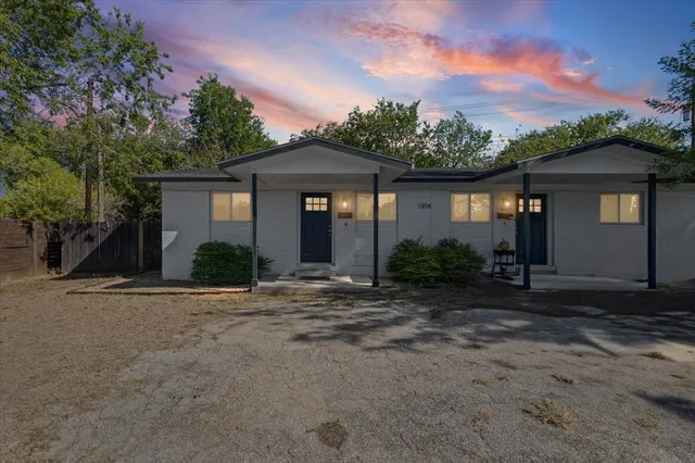 front view of a house with a street