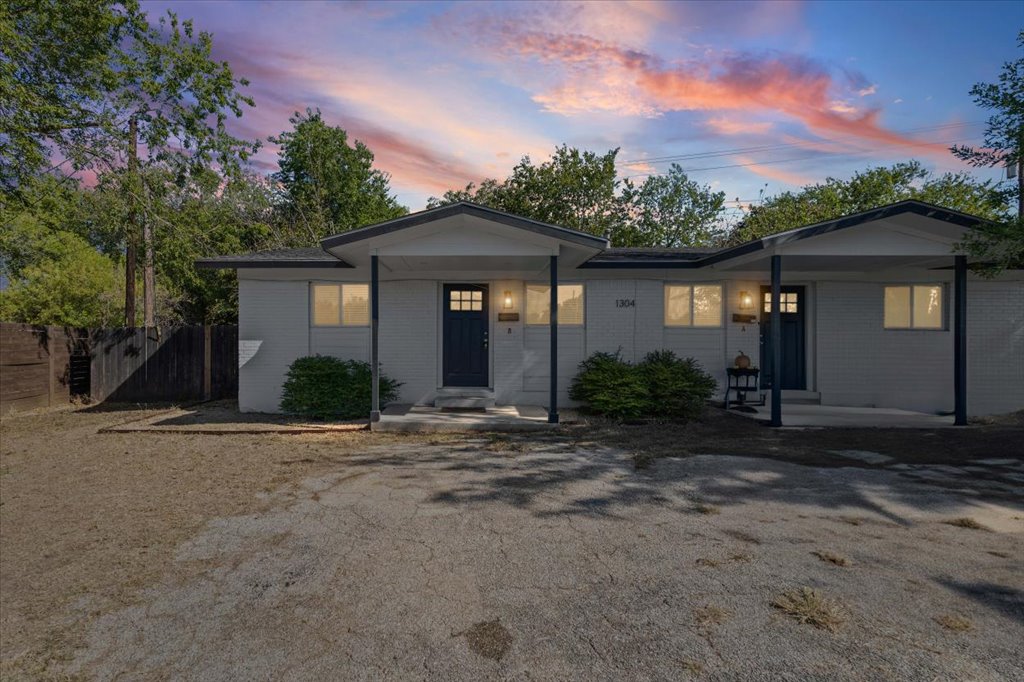 front view of a house with a street
