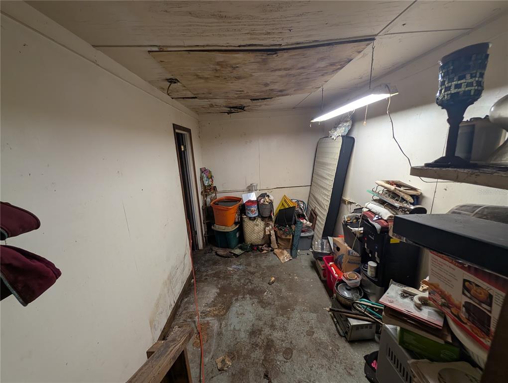 2516 Hebb Road Auburndale, FL 33823 - Photo 15 of 55 a view of a room with gym equipment