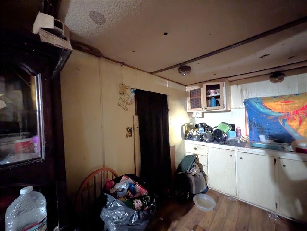 2516 Hebb Road Auburndale, FL 33823 - Photo 27 of 55 a room with furniture and wooden floor