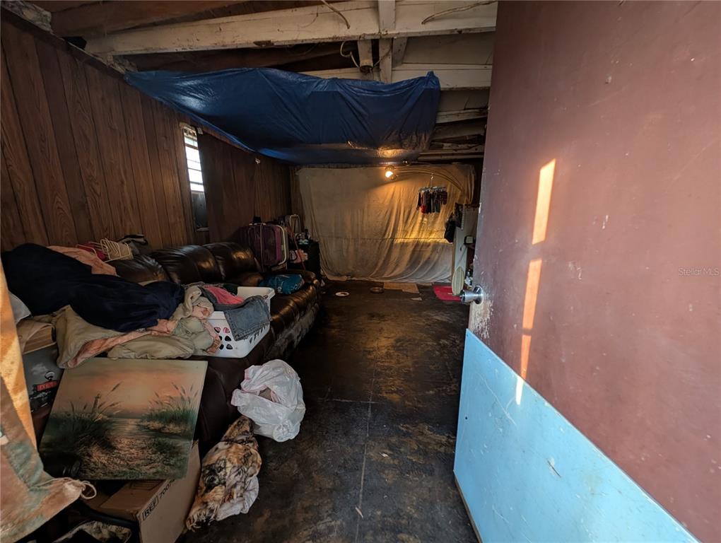 2516 Hebb Road Auburndale, FL 33823 - Photo 37 of 55 a room with furniture and gym equipment