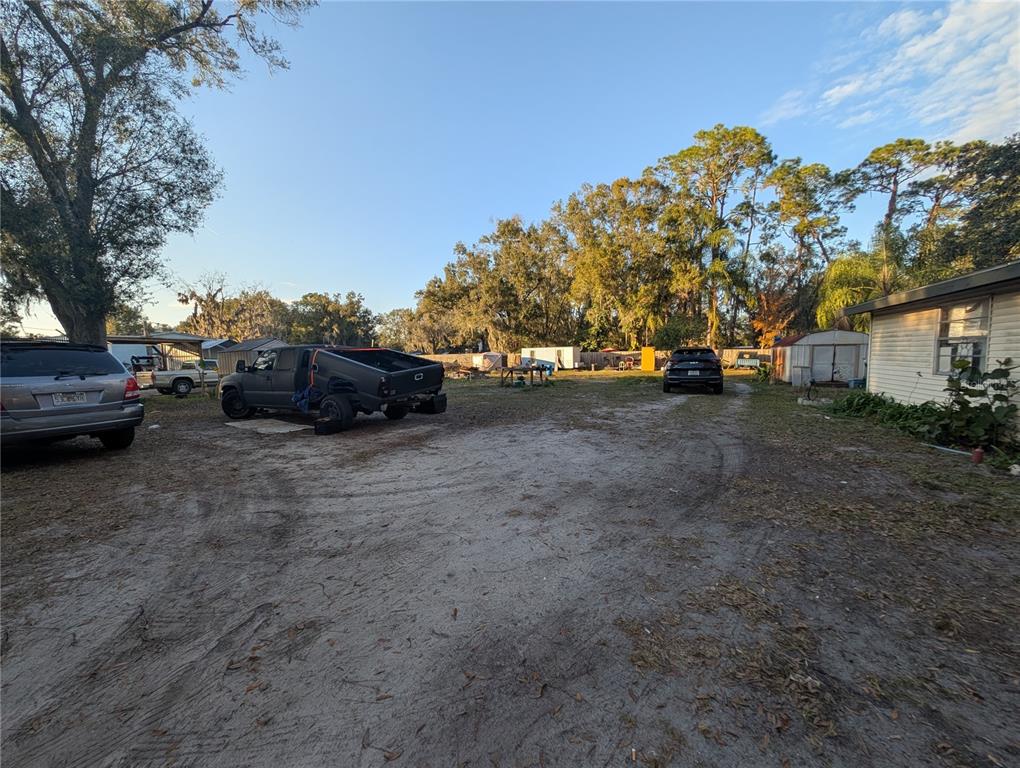 2516 Hebb Road Auburndale, FL 33823 - Photo 40 of 55 a view of a car parked in front of a house