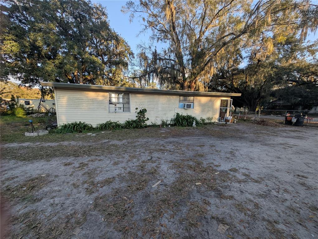2516 Hebb Road Auburndale, FL 33823 - Photo 41 of 55 a view of a house with a backyard