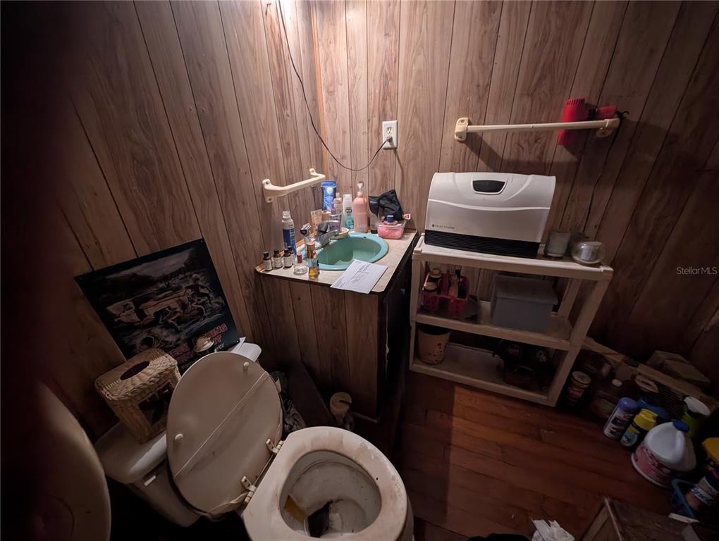 2516 Hebb Road Auburndale, FL 33823 - Photo 5 of 55 a living room with furniture and a fireplace