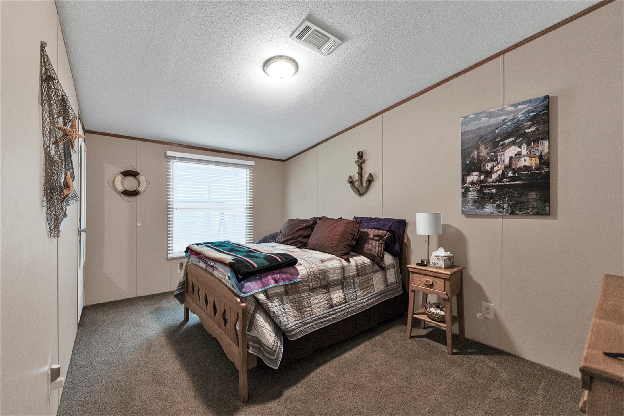 50 Fm 3179 Road Huntsville, TX 77320 - Photo 23 of 45 Functional second bedroom offers flexibility and convenience.