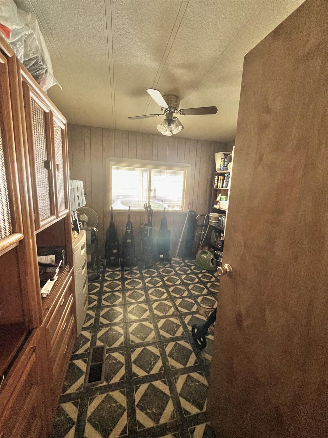 33188 George Smith Road Squaw Valley, CA 93675 - Photo 15 of 43 a bathroom with a glass shower door and a window