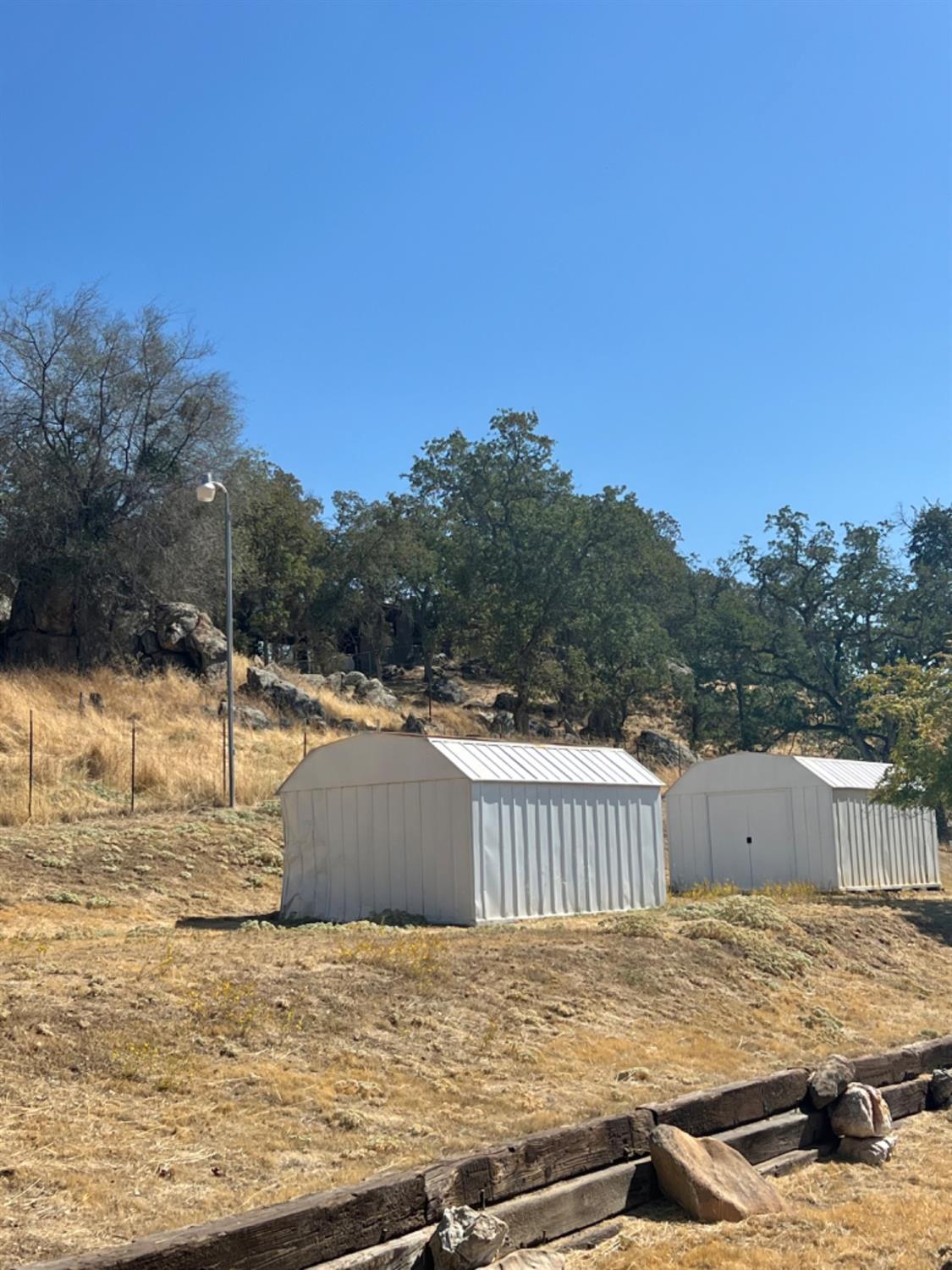 33188 George Smith Road Squaw Valley, CA 93675 - Photo 29 of 43 a view of a swimming pool with a yard