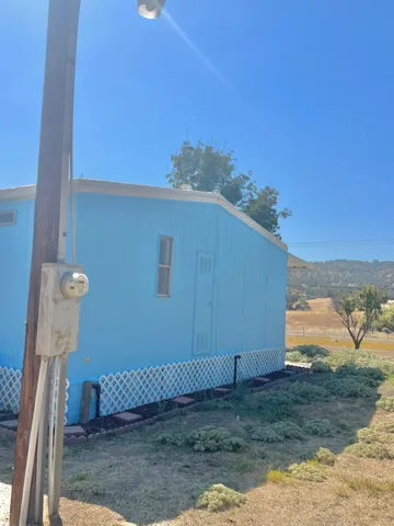 a view of a house with a patio