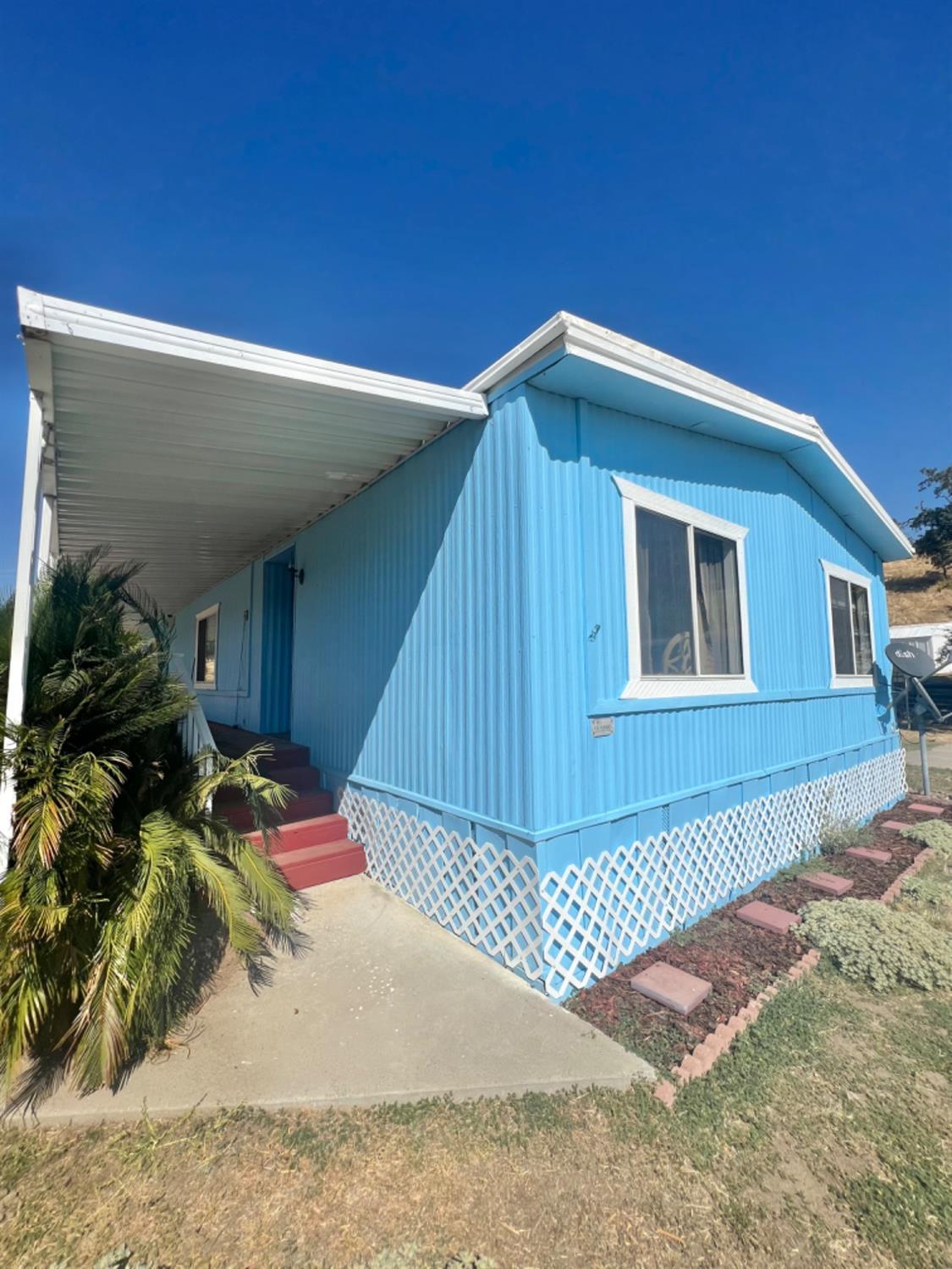 33188 George Smith Road Squaw Valley, CA 93675 - Photo 33 of 43 a view of a house with a patio