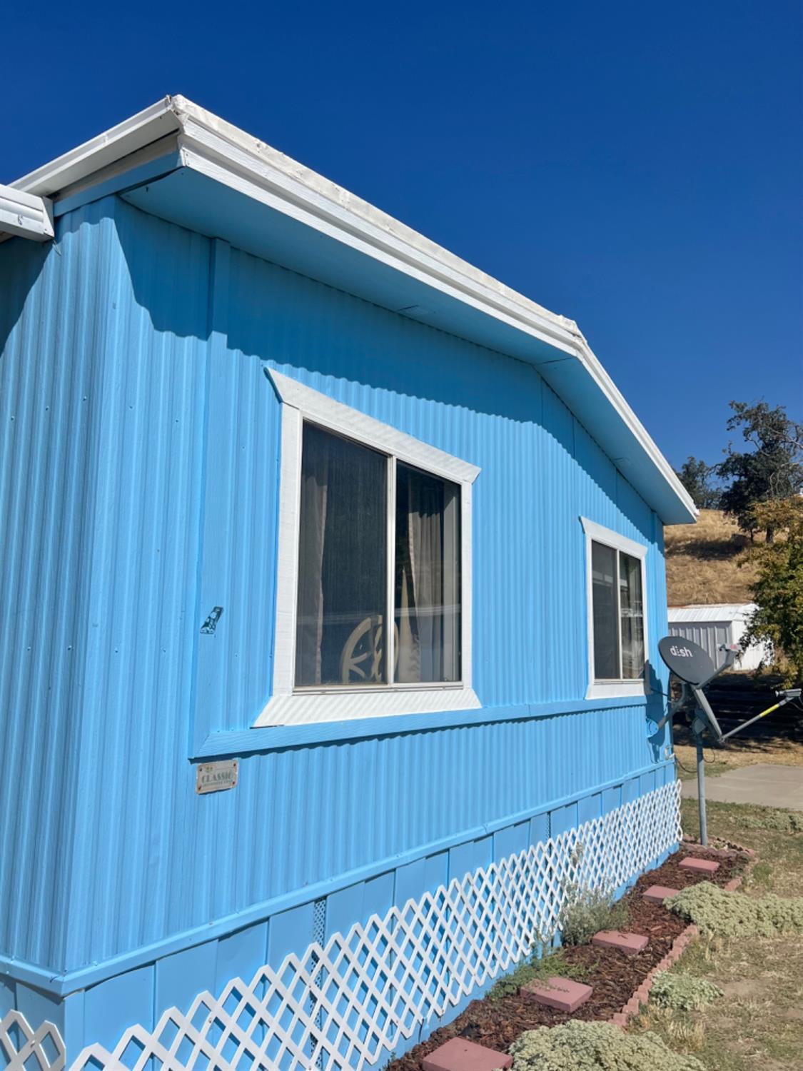 33188 George Smith Road Squaw Valley, CA 93675 - Photo 36 of 43 a view of a house with a yard