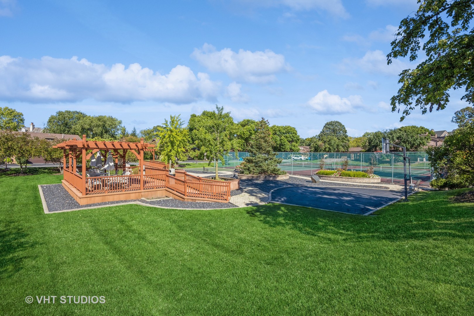 1409 Burr Oak Road, Unit 315A Hinsdale, IL 60521 - Photo 3 of 22 a view of a swimming pool with a yard