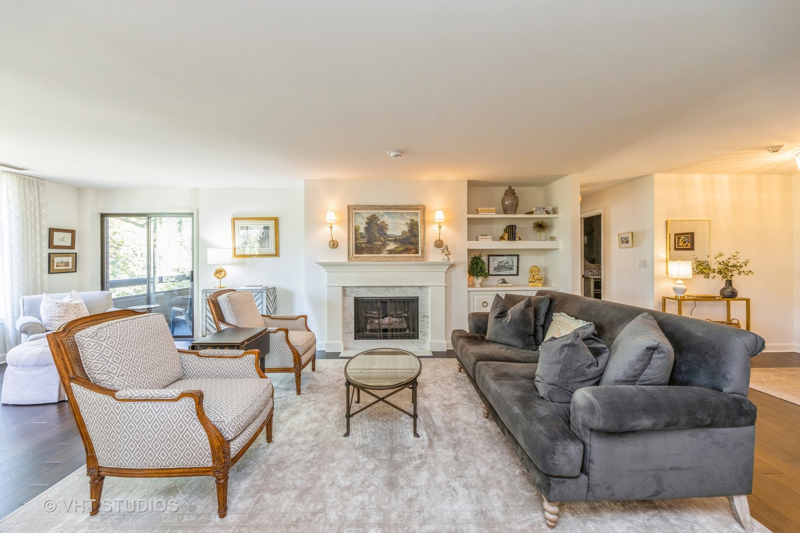 1409 Burr Oak Road, Unit 315A Hinsdale, IL 60521 - Photo 9 of 22 a living room with furniture and a fireplace