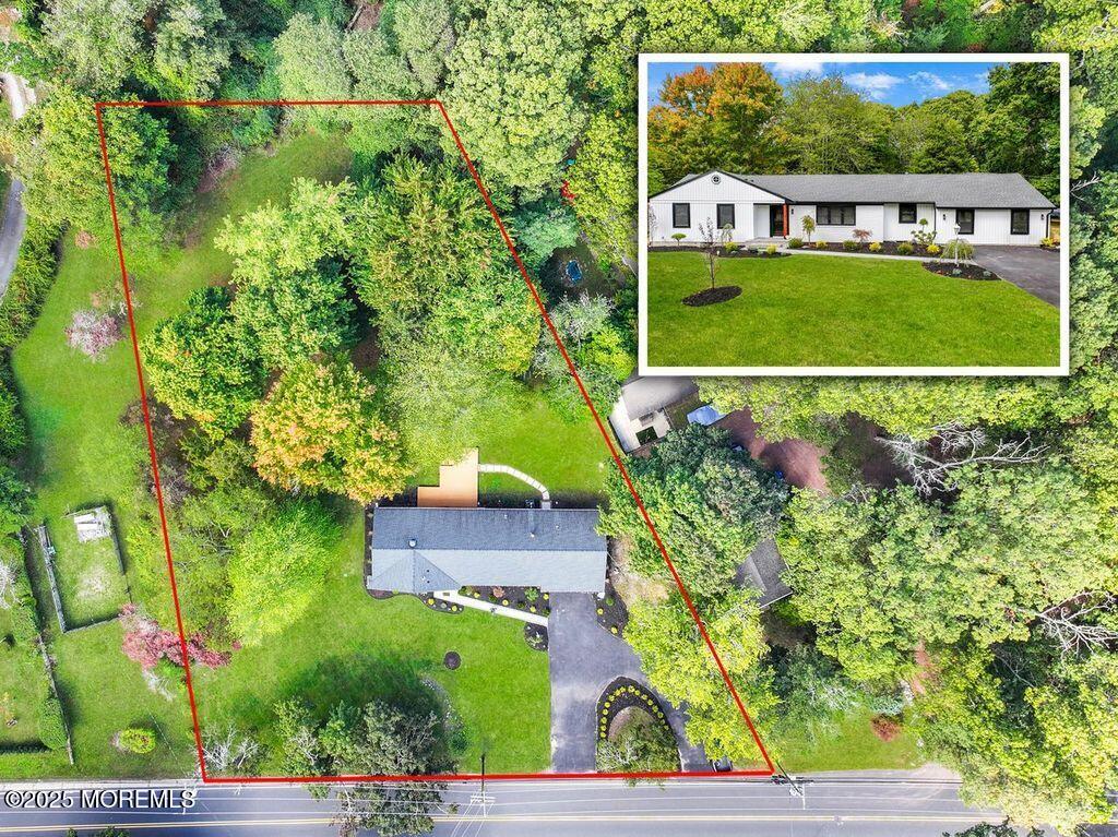 an aerial view of a house having garden