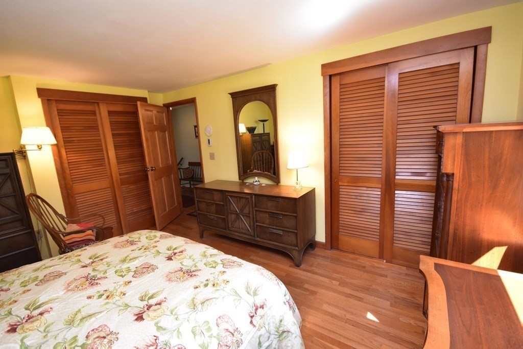 1175 Bay Road Amherst, MA 01002 - Photo 23 of 34 a bedroom with a bed and a dresser in it
