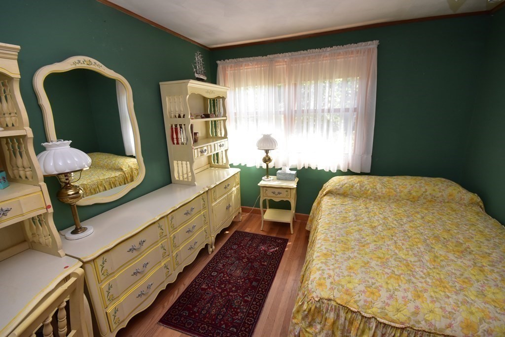 1175 Bay Road Amherst, MA 01002 - Photo 24 of 34 a bed room with a bed and a chair