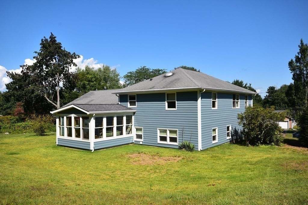 1175 Bay Road Amherst, MA 01002 - Photo 34 of 34 a front view of a house with a garden