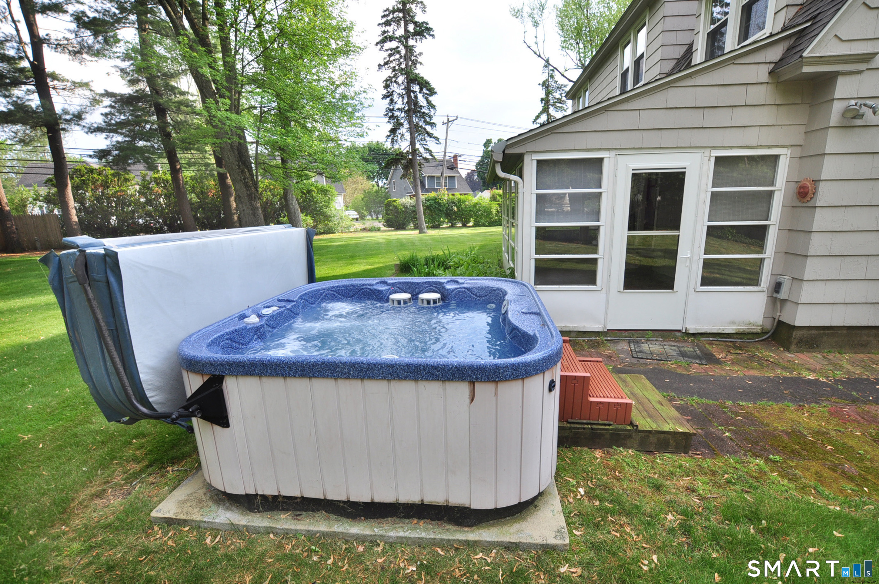 10 Harvey Road Windsor, CT 06095 - Photo 33 of 36 a view of backyard with outdoor seating and plants