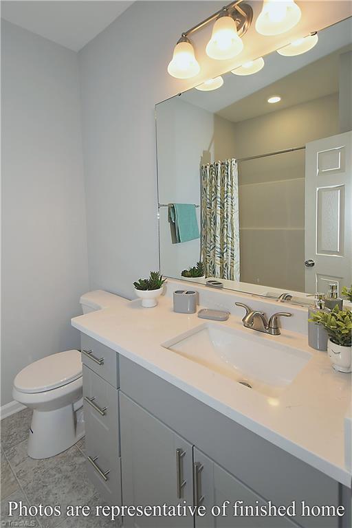 3429 Littlefield Way Greensboro, NC 27405 - Photo 36 of 40 Again with the upgraded quartz counters!!! Wow!