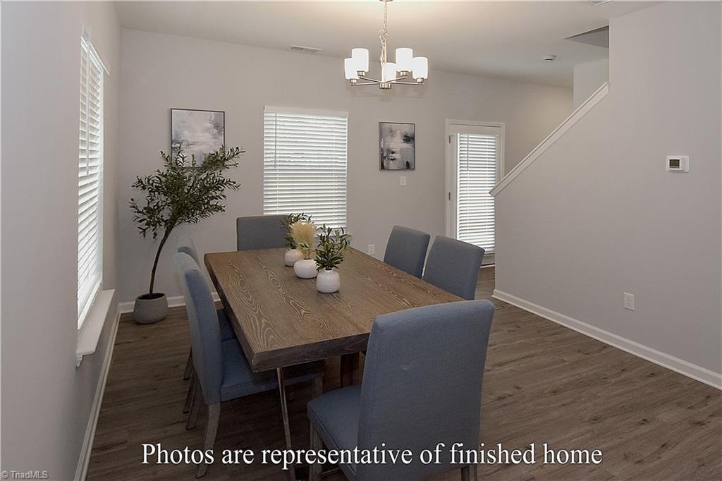 3429 Littlefield Way Greensboro, NC 27405 - Photo 8 of 40 The dining room enjoys lots of natural light.