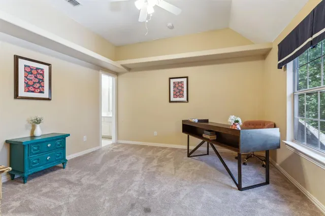 a room with furniture and a window