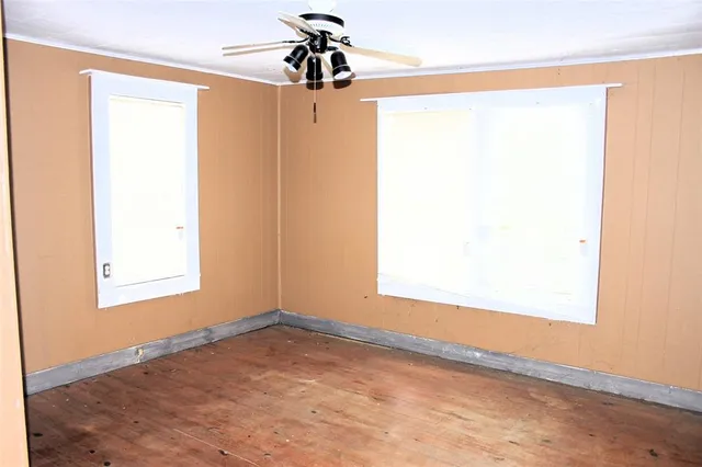 a view of a big room with a window