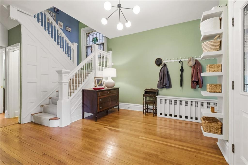 1127 Portland Street Pittsburgh, PA 15206 - Photo 18 of 50 a view of entryway livingroom and hall with wooden floor