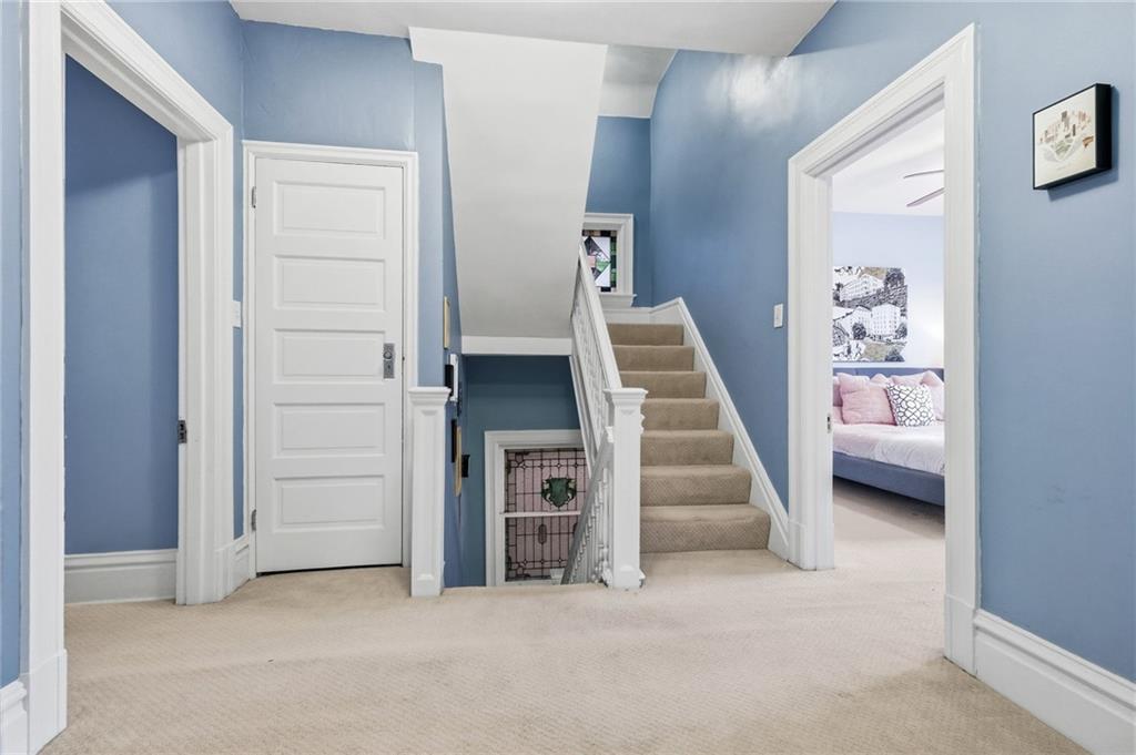 1127 Portland Street Pittsburgh, PA 15206 - Photo 29 of 50 a view of a livingroom with furniture and staircase