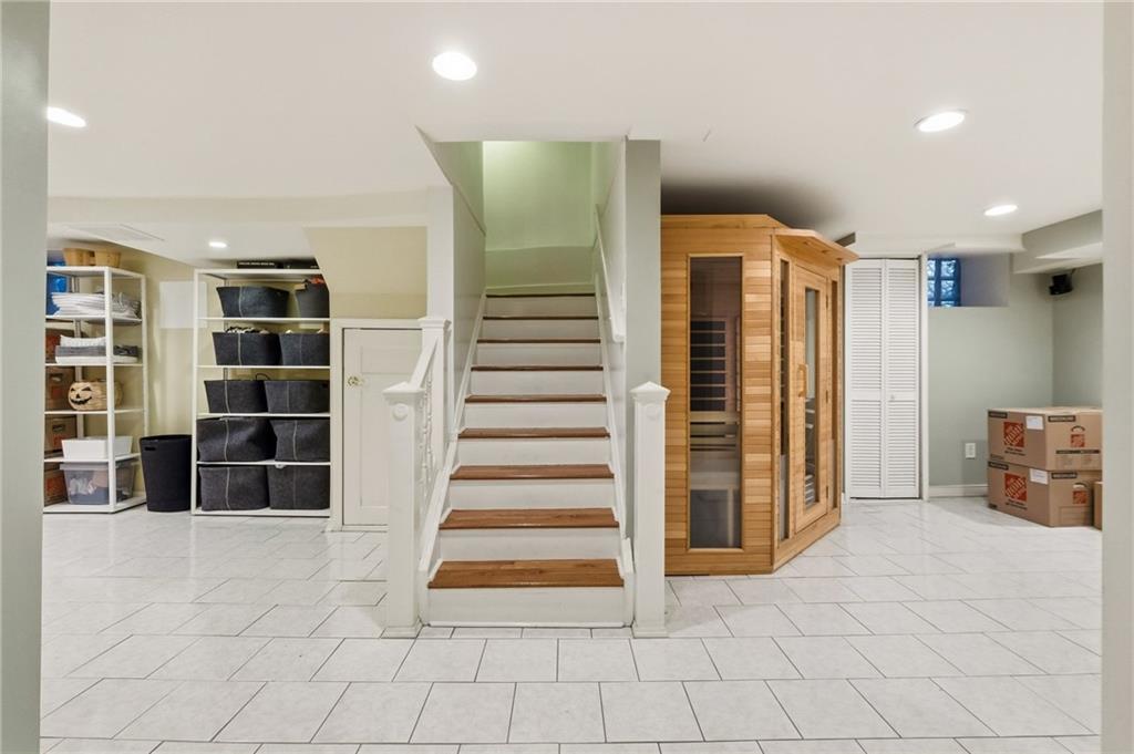 1127 Portland Street Pittsburgh, PA 15206 - Photo 37 of 50 a view of a livingroom with a staircase