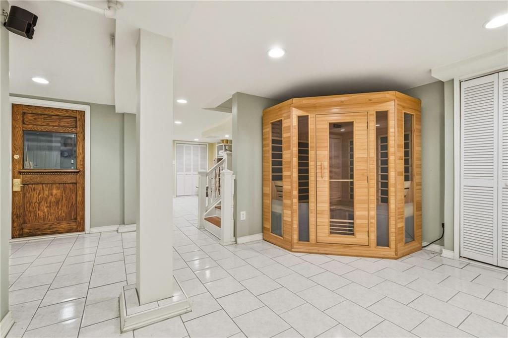 1127 Portland Street Pittsburgh, PA 15206 - Photo 38 of 50 a view of a hallway with wooden shelves