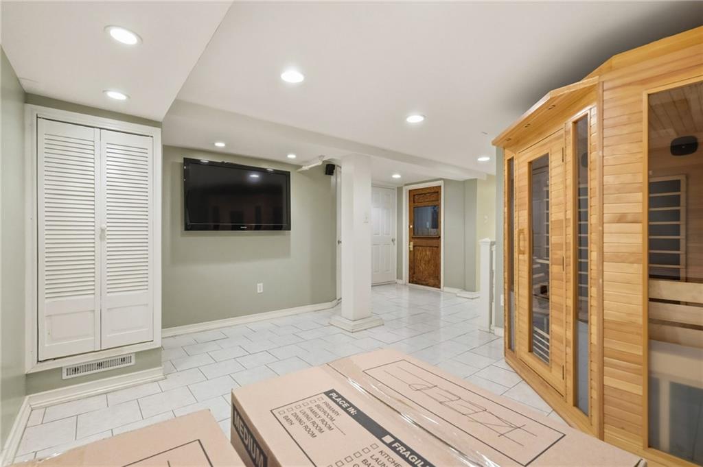1127 Portland Street Pittsburgh, PA 15206 - Photo 39 of 50 a view of a hallway with wooden floor and staircase