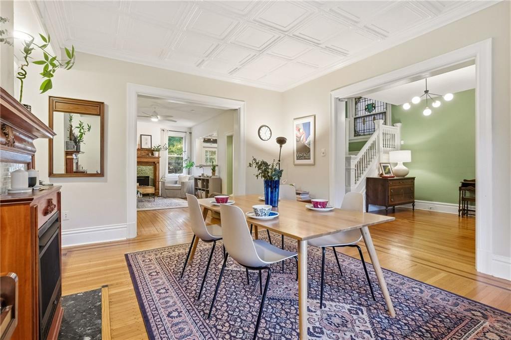 1127 Portland Street Pittsburgh, PA 15206 - Photo 10 of 50 a view of a dining room with furniture